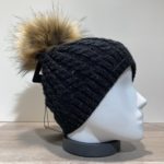 Bonnet torsadé uni noir fil en lurex brillant doublé avec pompon Herman