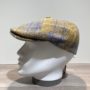 Casquette laine vierge Harris tweed avec bouton moutarde doublée
